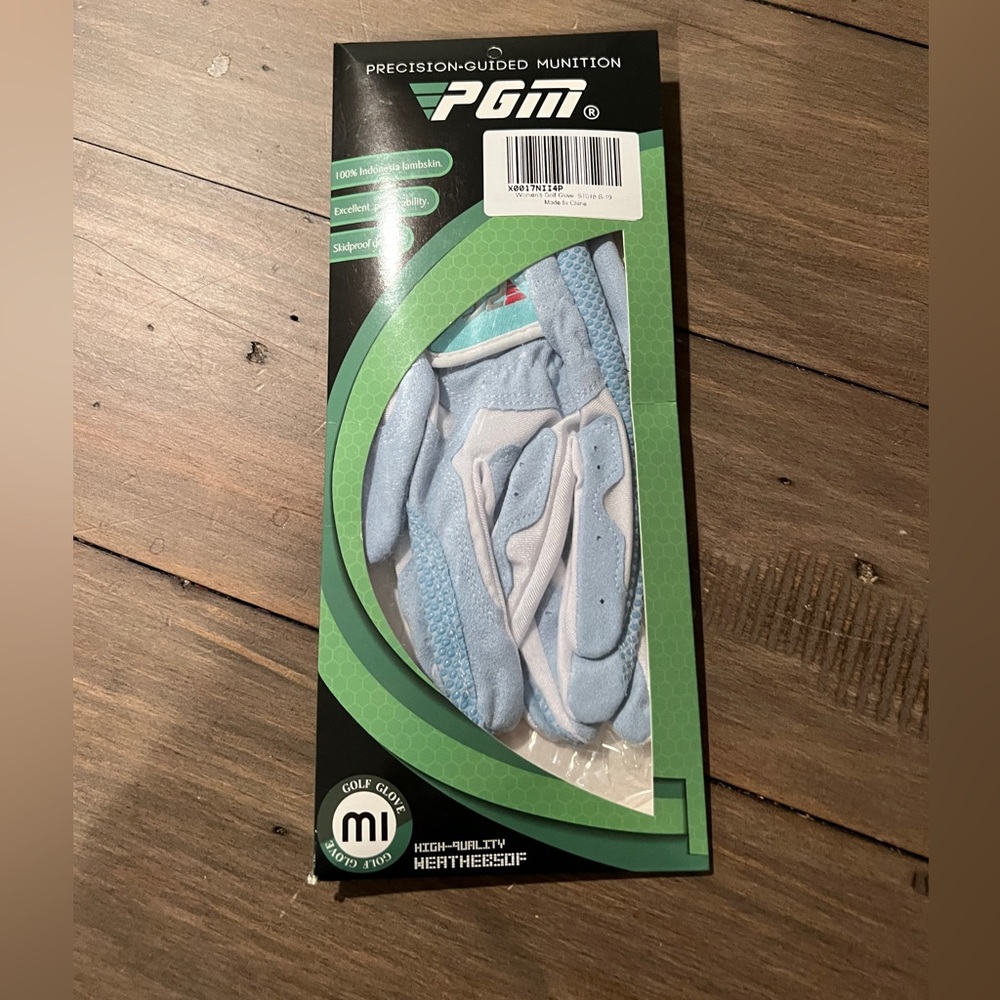 PGM set of light blue golf gloves. Size medium. New in packaging.